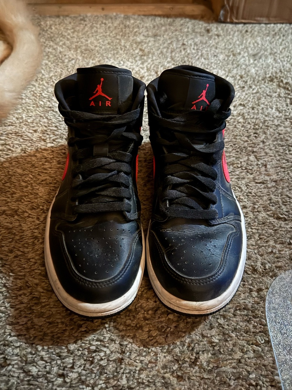 Jordan 1 Mid Black and Red Sneakers